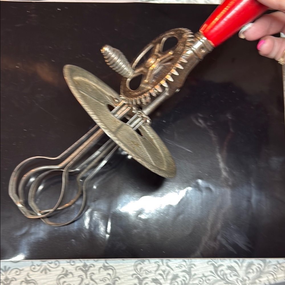 Vintage Handheld Egg Beater with Red Handle